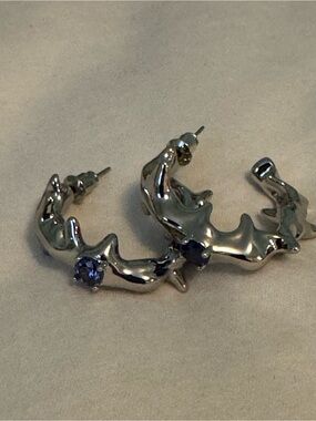 Silver Sculpted Hoop Earrings with Blue Accent Stone